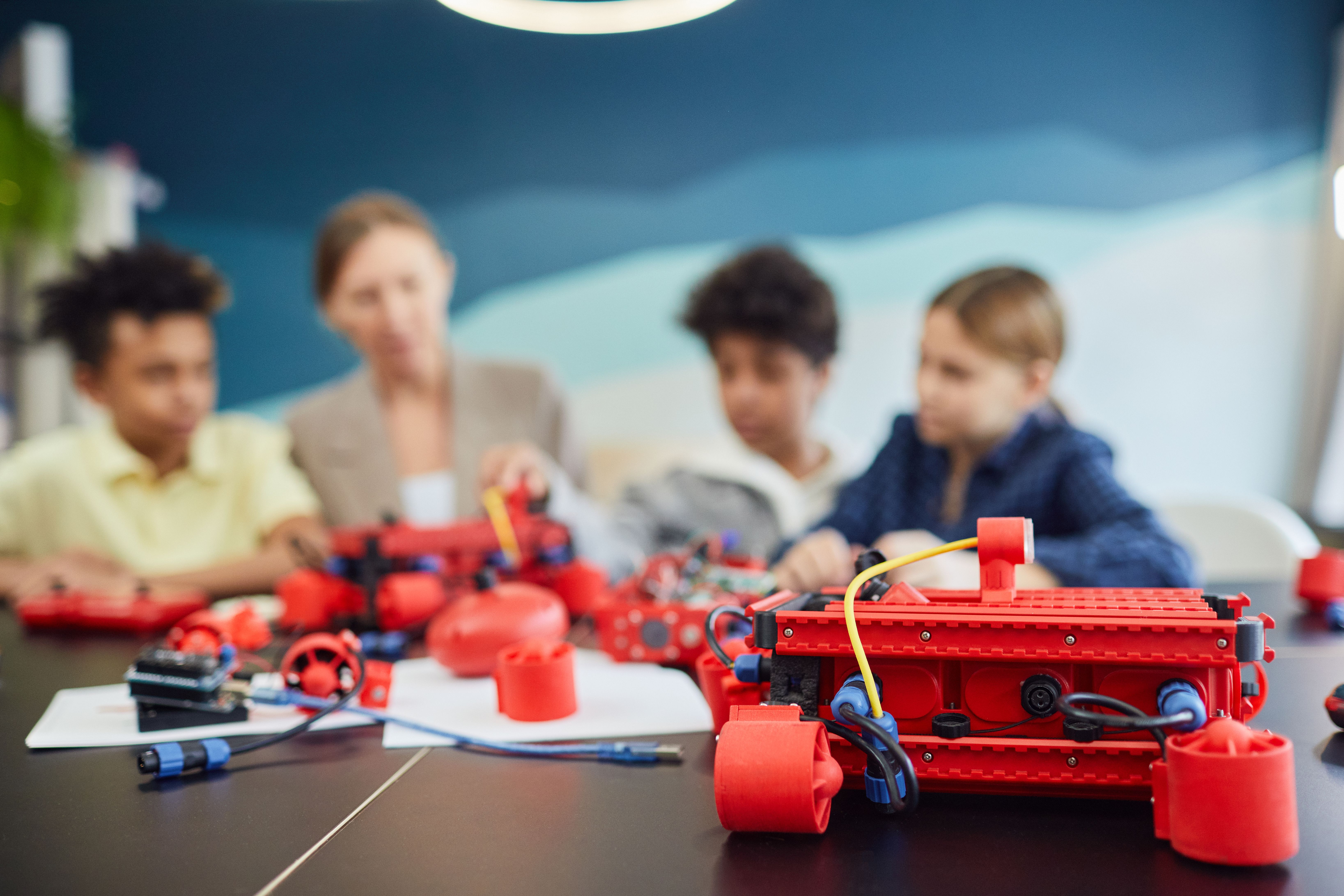 RoboGenz trainer with students